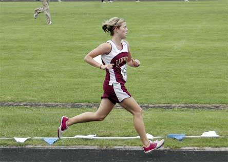 Lakewood junior Chelsea Stokes sprints to the finish line at South Whidbey High School