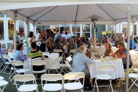 Guests enjoy their meals Aug. 29 during the 'Taste of Washington' fundraiser for Kids Kloset.