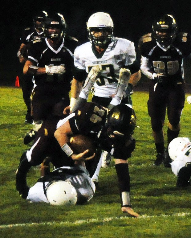 Ian Ware of Lakewood fights for every inch.