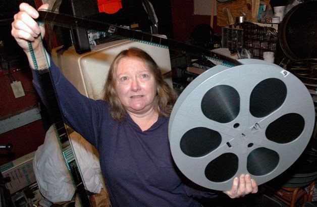 Olympic Theatre owner Norma Pappas has to check the 2