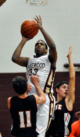 Senior Tre Haslom scores two of his 22 points vs. Blaine.