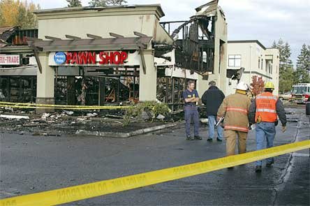 Crews survey damage done to businesses Monday