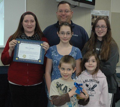 Arlington School District parent Mary Levesque was joined by her husband Ken