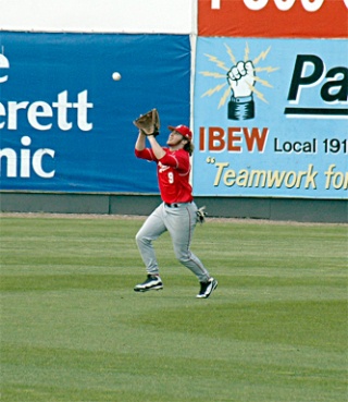 Tomahawk center fielder Austin Denton grabs a fly ball