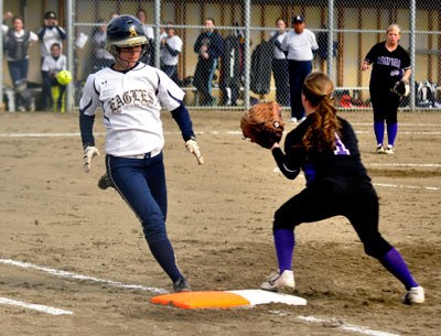 Arlington’s Hayley Fields runs to first