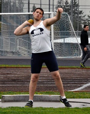 Dan Boyden competes in the boys shot put in a home meet against Snohomish on Thursday