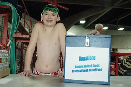 Eagle Creek Elementary student Burch Walker recently collected $328 for the American Red Cross during a pool party.