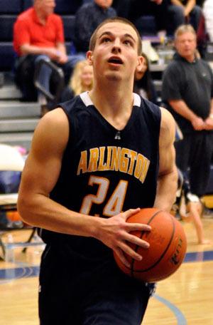 Arlington’s Bradey Brummel attempts a shot during the 4A Boys District 1 Championship game on Friday