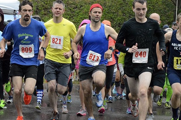 Arlington triathletes endured wet conditions during the Peddle Paddle Puff race July 4 at Haller Park.