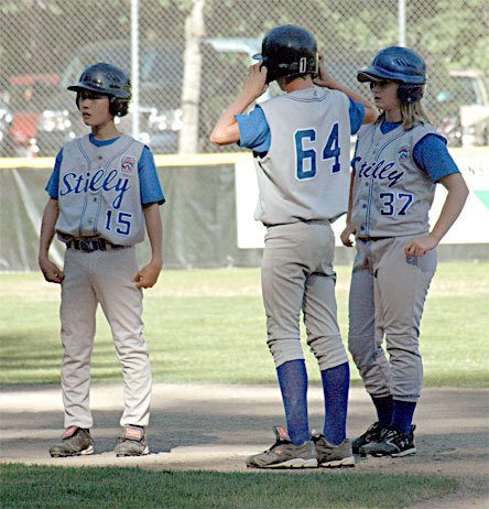 As North Everett warms up a new pitcher in the sixth inning