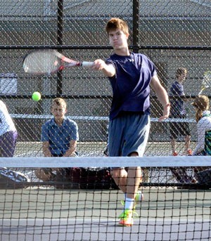 Eagles’ No. 1 singles player Trent Sarver competes against Lake Stevens’ No. 1 singles player Gavin Gershmel on Oct. 11.