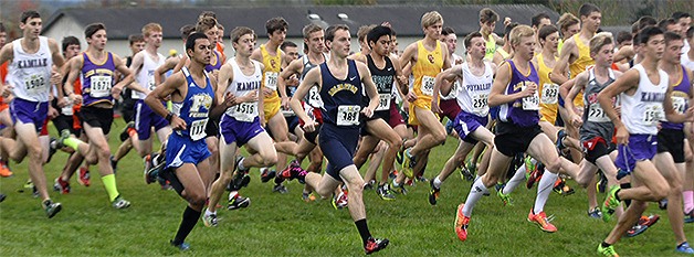 The boys are packed in tight at the start of the Hole in the Wall cross country meet Oct. 10.