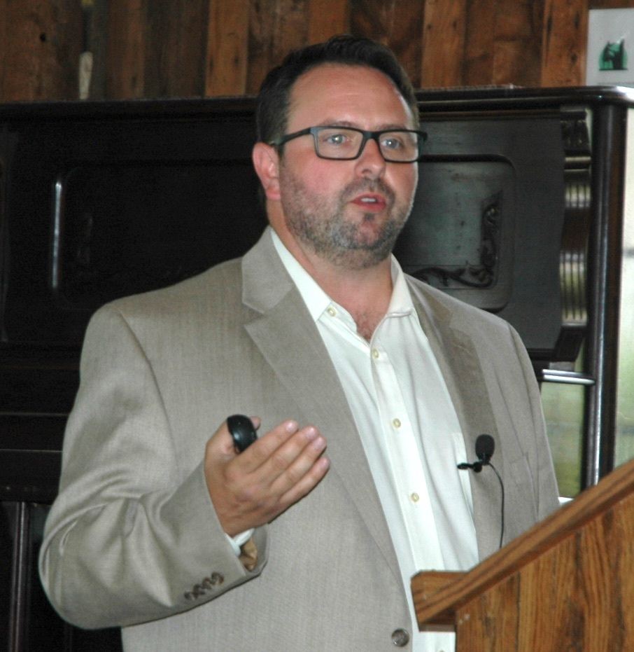 Kirk Boxleitner/Staff PhotoCity IT manager Bryan Terry addresses the Arlington-Smokey Point Chamber of Commerce July 12 about how they can maintain information security in their businesses and households.
