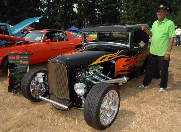 Marysville’s David Wade has invested so much money in his 1931 Ford Model A that its pin-stripes and engine are literally “money green.”