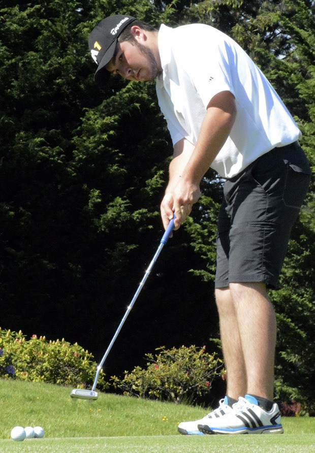 Austin Faux of Arlington practices his putting in a recent practice.