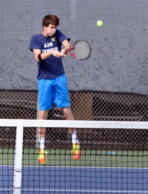 Eagles No. 1 varsity singles player Trent Sarver competes against a Spartan on Sept. 5 at Stanwood High School.