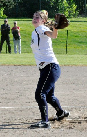 Senior Ronnie Ladines throws a pitch during the Wesco 4A District 1 Championship game on Thursday