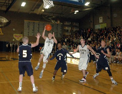 Arlington junior guard Kaleb Bryson prepares to score against the Marauders during a Tuesday