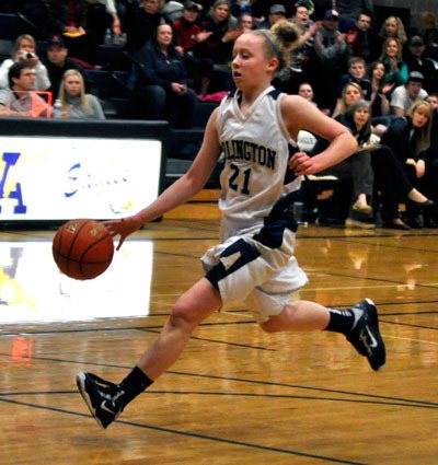 Arlington freshman guard Emma Janousek breaks to score during the Feb. 6 home game against Kamiak High School.