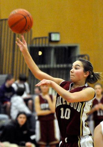 Junior point guard Caitlyn Darrah floats a 3-pointer against Granite Falls.