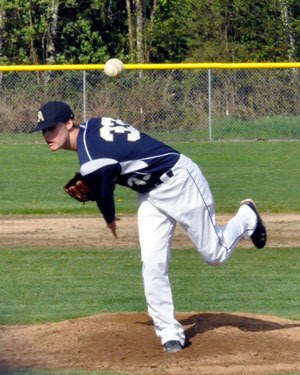 Eagles’ Garrett Atkinson pitches a fastball against a Stanwood batter during the team’s April 27 home game.