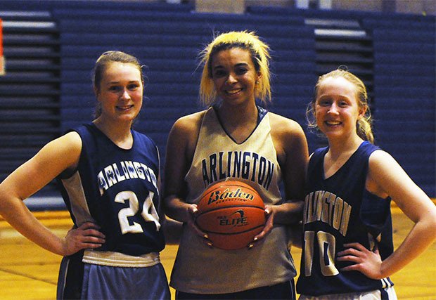 Arlington girls basketball team captains from the left