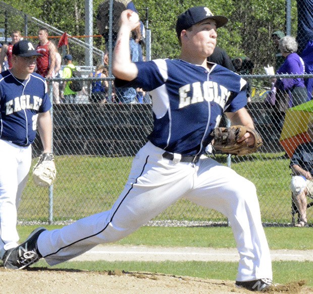 Arlington's Tristan Sheward delivers pitch.