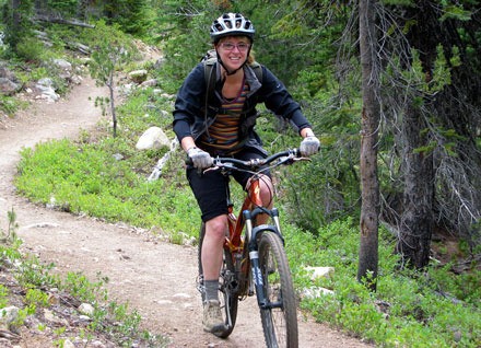 Lakewood Mountain Bike Club assistant coach Heidi Klippert takes on a hill during a recreational ride near Issaquah.