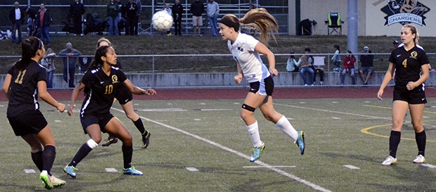 Brandon Adam/Staff PhotoA Marysville Getchell soccer player heads the ball.