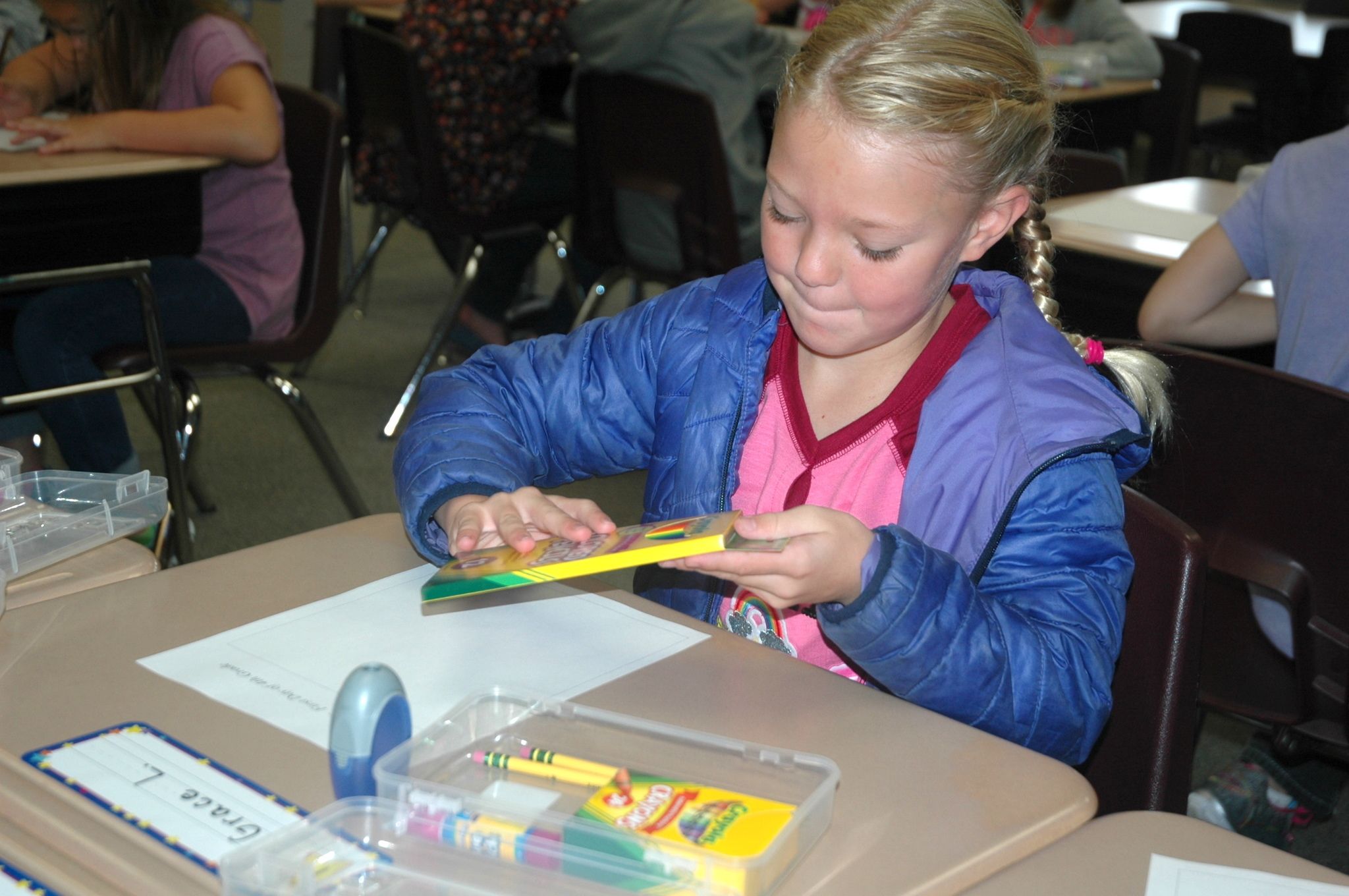 Kirk Boxleitner/Staff PhotoGrace Lish gets out her school supplies in her third-grade classroom during the first day of school at Pioneer Elementary Sept. 7.