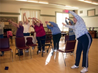 Seniors gather at the Stillaguamish Senior Center for exercise and many other services. A new housing complex next door being built by Himalayan Homes will be open for tours Sunday