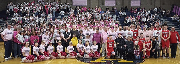 Arlington High School's gym was awash in pink at the recent Coaches vs. Cancer game against Marysville-Pilchuck.