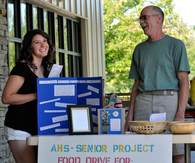 Arlington High School student Kristina Flick and her father