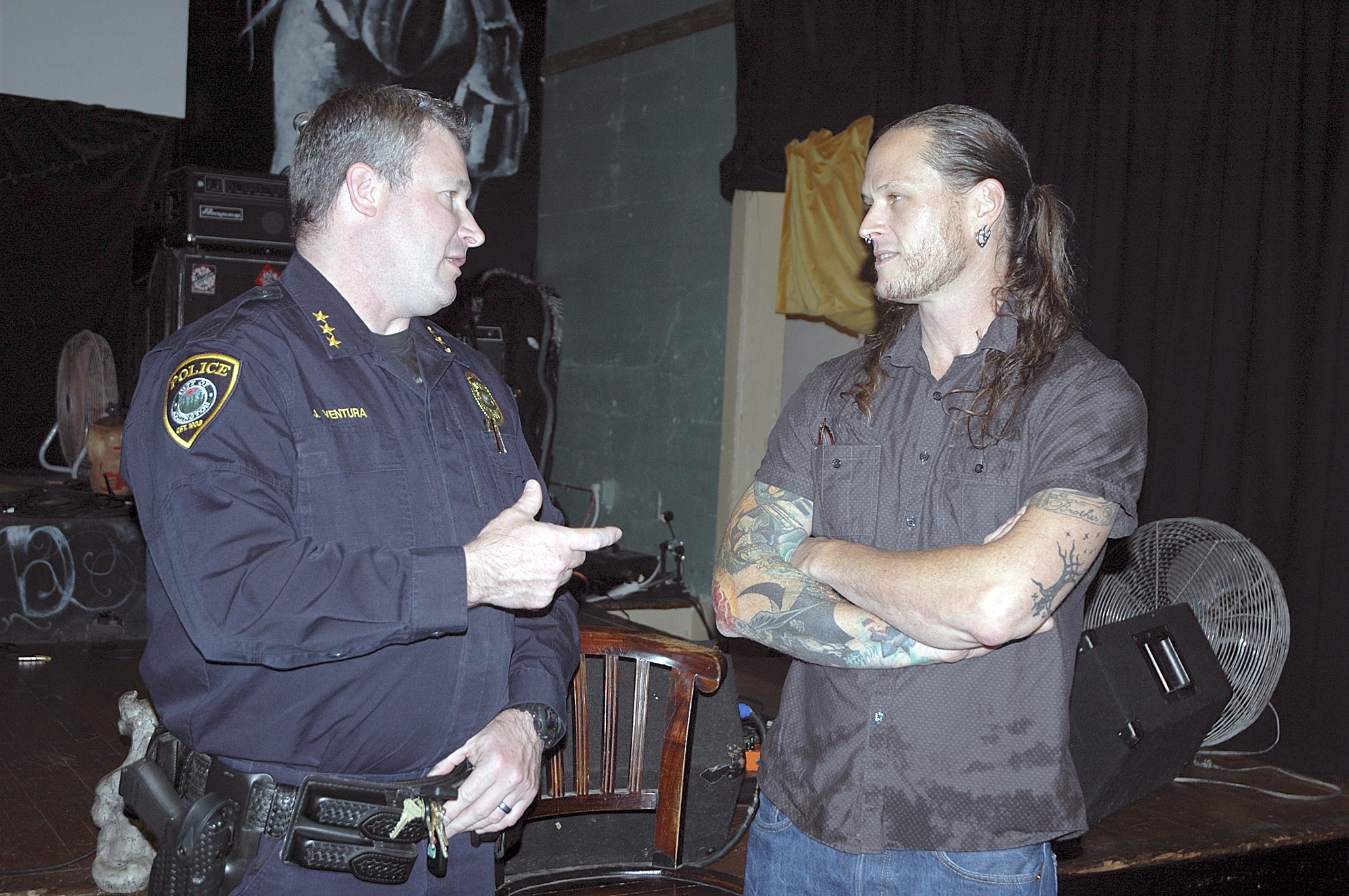 Kirk Boxleitner/Staff PhotoArlington Police Chief Jonathan Ventura chats with Anthony Beck