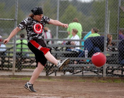 Arlington resident Jordan Spiethof of AMT singles down the third baseline.