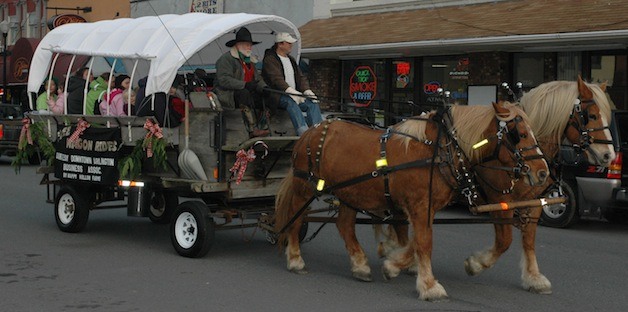 Attendees of Arlington’s ‘Hometown Holidays’ will be able to hitch rides on the covered wagon running up and down Olympic Avenue again this year.