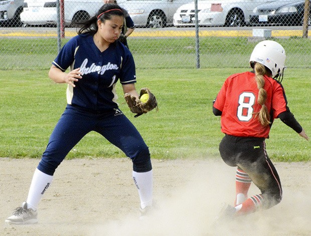 An Arlington player fields a ball at second base.