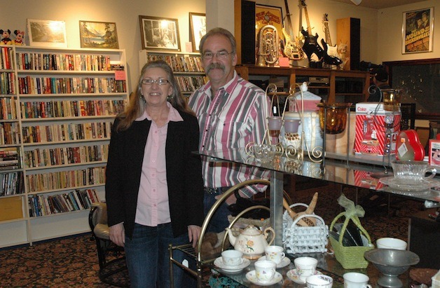 Becky and Jeff Phebus are proud to show off their selection of goods at the Lil' Thrift store in downtown Arlington.