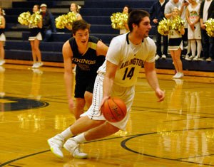 Arlington post Noah Jones works his way inside the paint.