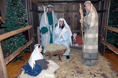Among those who donned costumes to serve in shifts as the live nativity