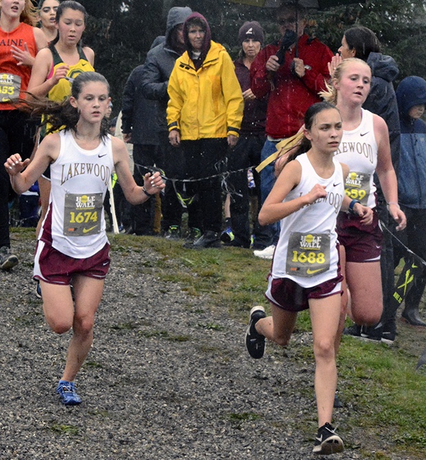 Brandon Adam/Staff PhotoLakewood runners running the girls race at the annual Hole in the Wall invitational Oct. 8.