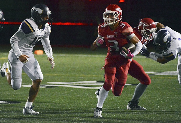 Brandon Adam/Staff PhotoMarysville-Pilchuck’s Justin Trueax carries the ball.