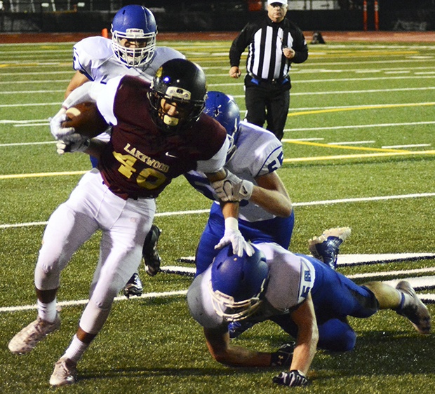 Brandon Adam/Staff PhotoLakewood’s Matt Ramirez shedding off Sedro-Woolley defenders.