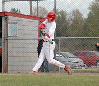 M-P senior Tyler Holm connects with the ball
