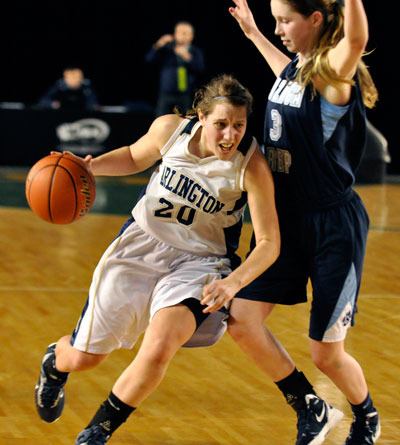 Arlington's Krista Showalter drives past a Gonzaga Prep defender during the Lady Eagles' 43-40 victory  on Feb. 28.