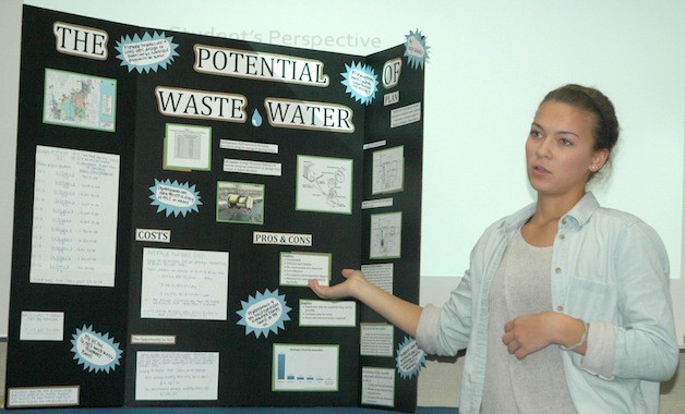 Arlington High School senior Paige Quander presents her proposal for converting waste water into energy to the Arlington school board Sept. 22.