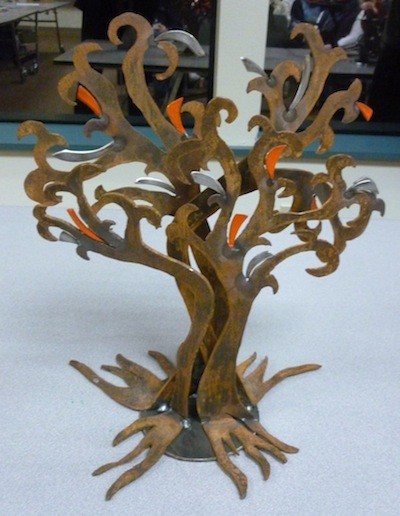 Debbi Rhodes’ ‘Rooted Embrace’ metal tree sculpture could be planted by the Centennial Trail as early as this summer.