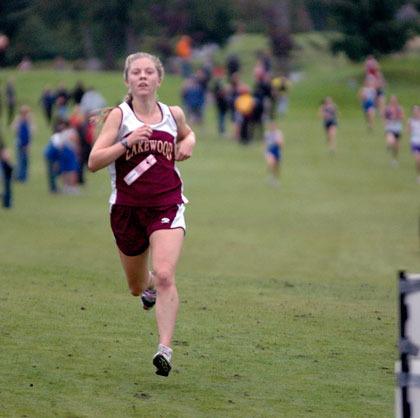 Lakewood junior Rachel Cundy sees the finish line just a few feet ahead at the North County Invitational.