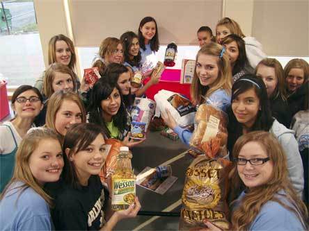 Arlington Police Chief Robert Sullenberger stands near a collection of letters