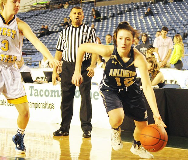 Arlington's Sevi Bielser drives inside West Seattle's court.